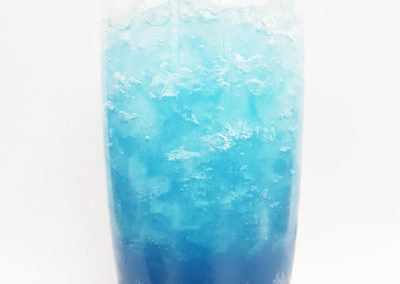 blue coloured drink on ice