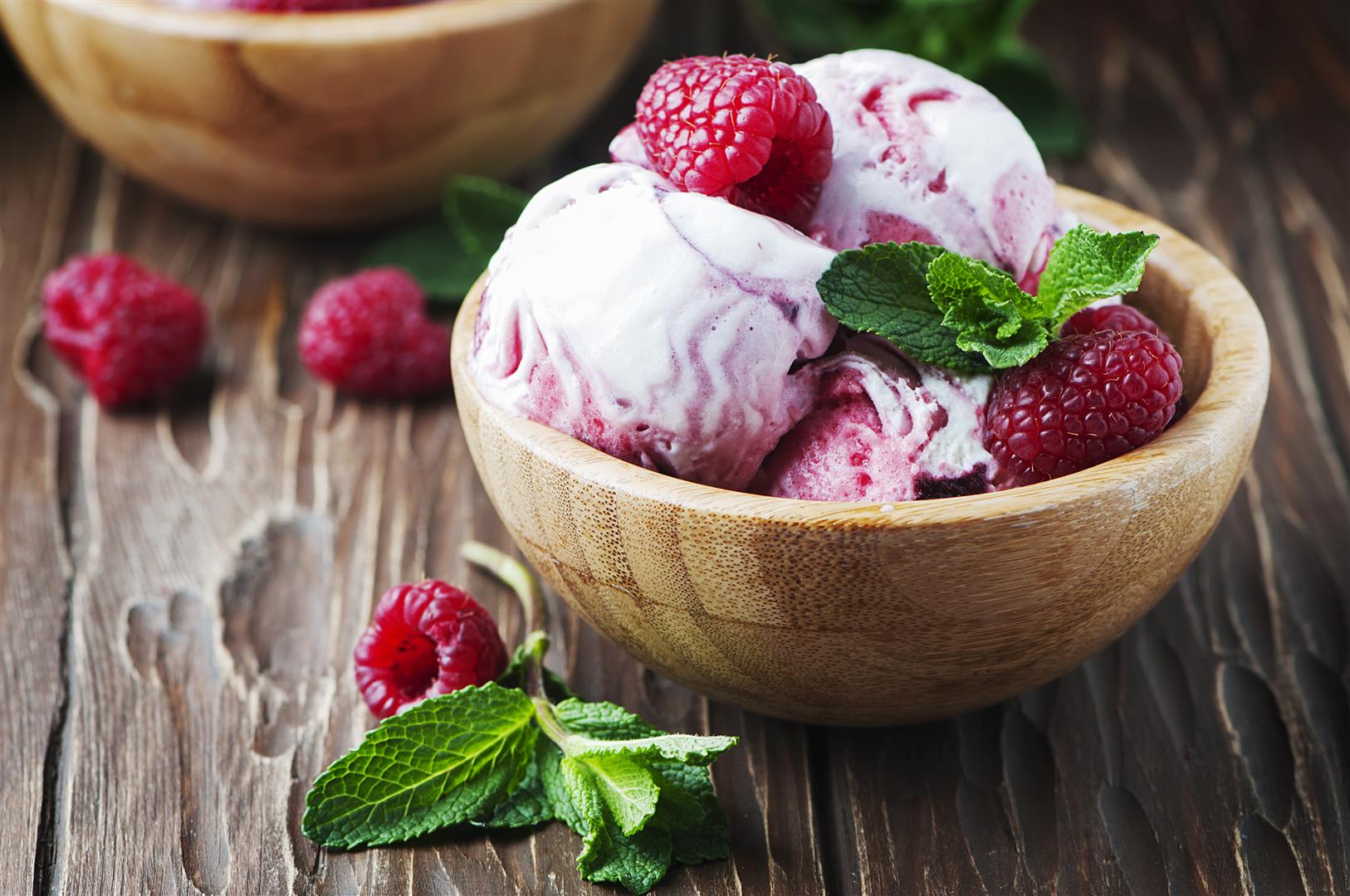 Delicious ice-cream witn mint and raspberry, selective focus