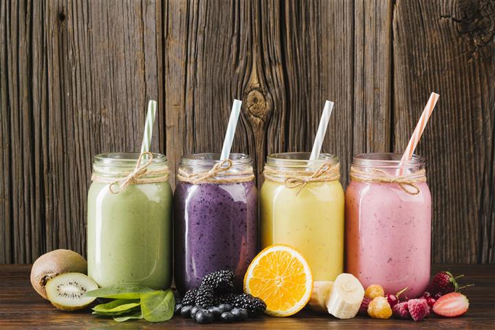 colorful-fruit-smoothies-composition-wooden-background (Large) (Small)