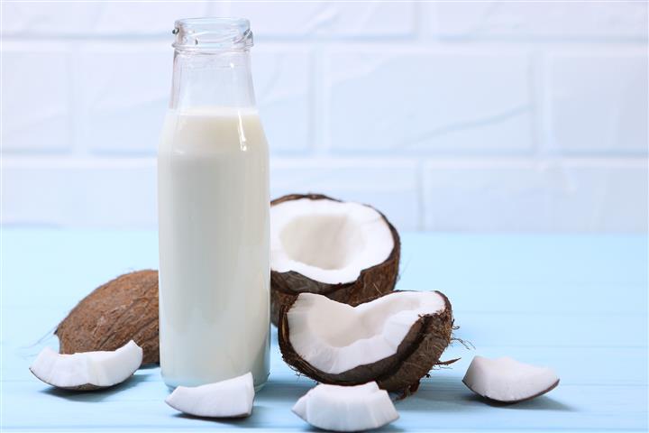 milk-broken-coconuts-table-vegetable-milk-veggie-drink (2) (Small)