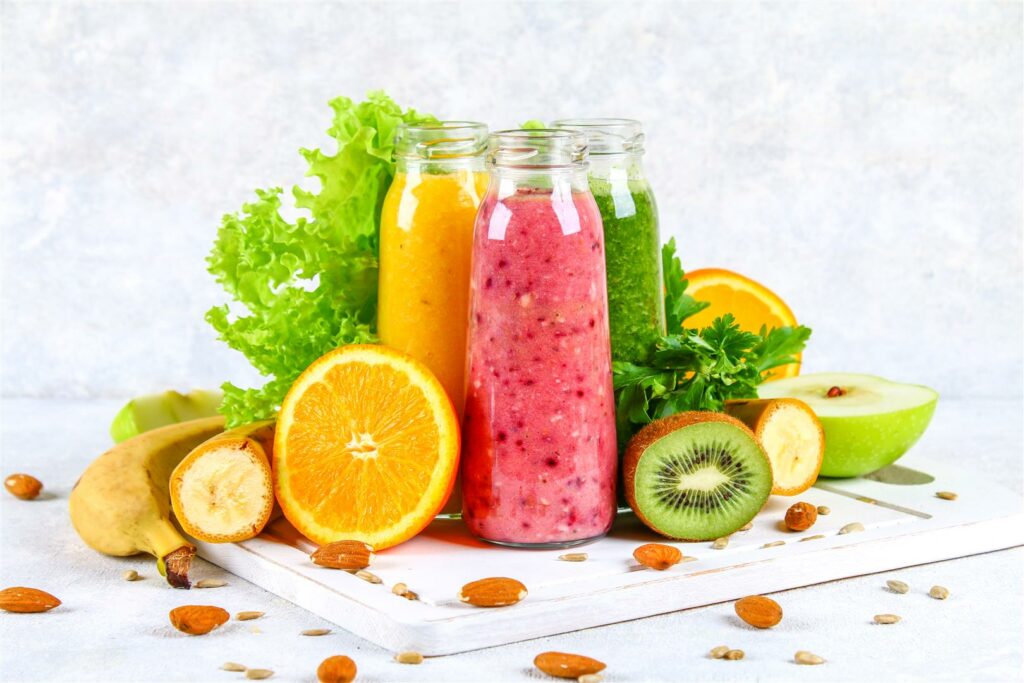 green-yellow-purple-smoothies-currant-bottles-parsley-apple-kiwi-orange-gray-table (Large)