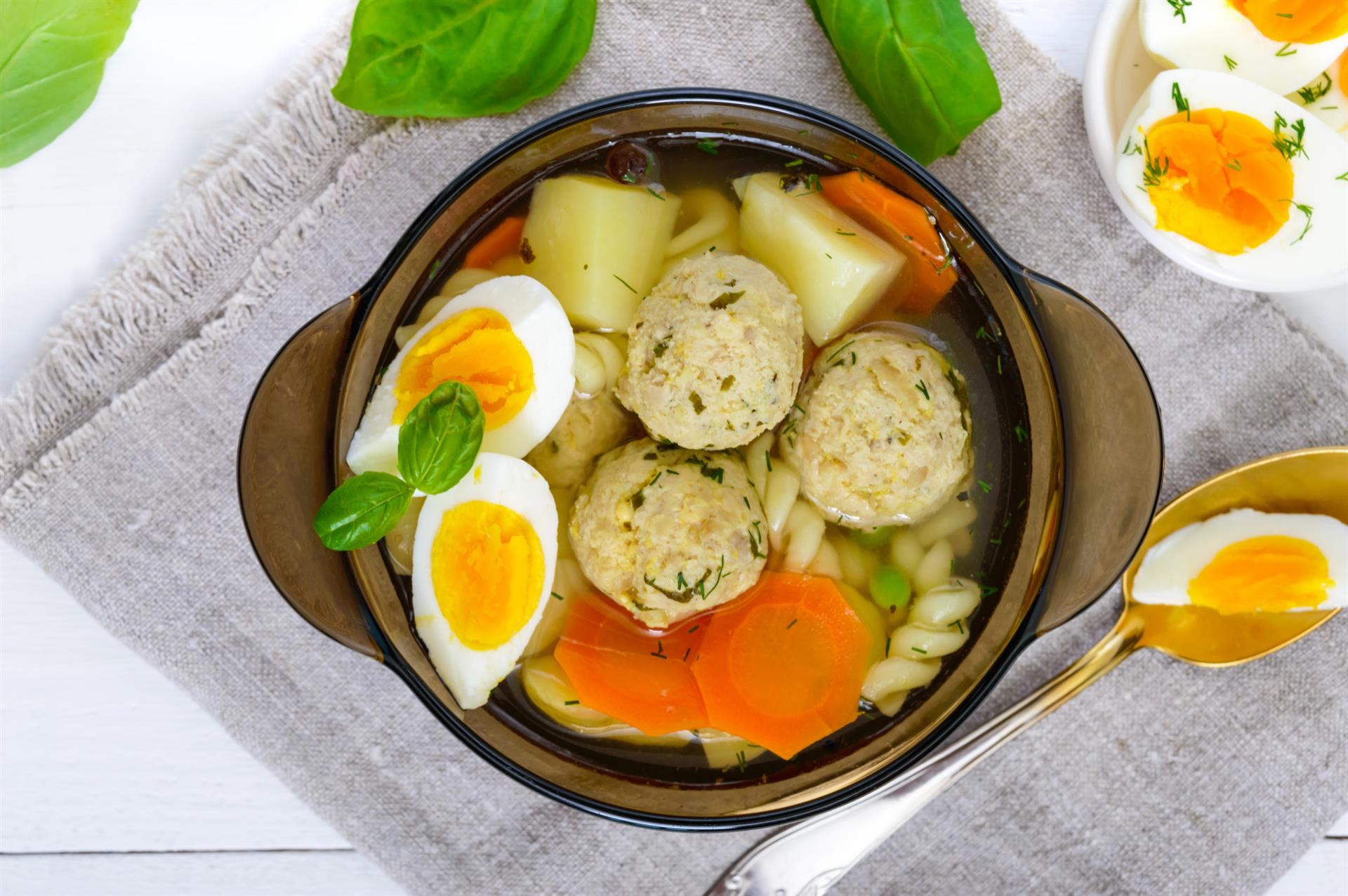 Bowl of soup with chicken meat balls and eggs (Custom)